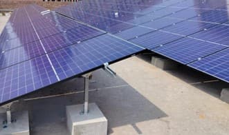 Technician installing panels